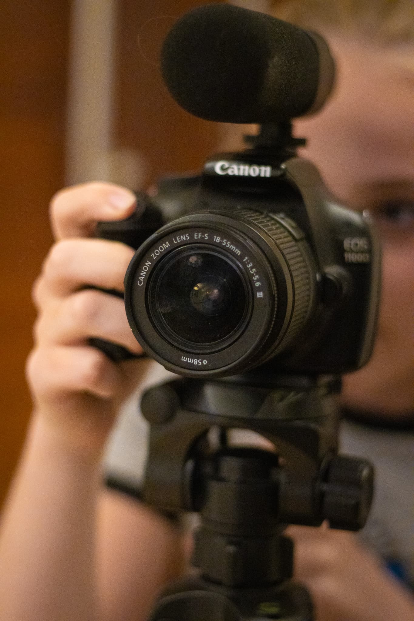 Student operating professional camera