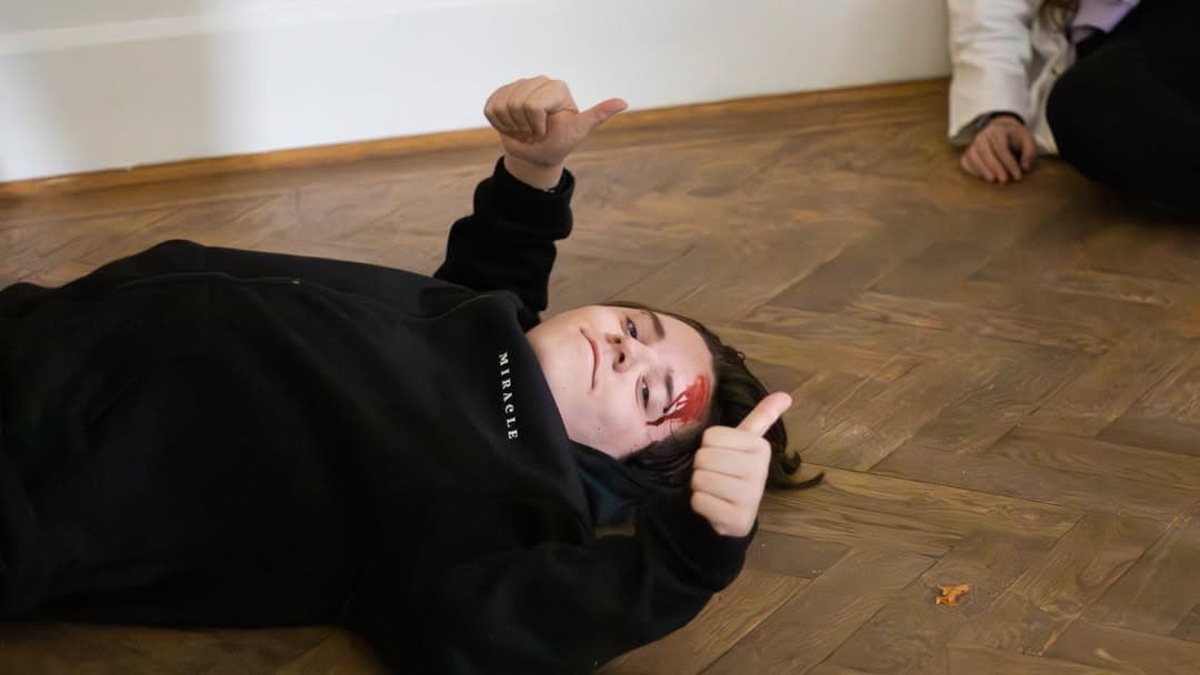 Student with film camera