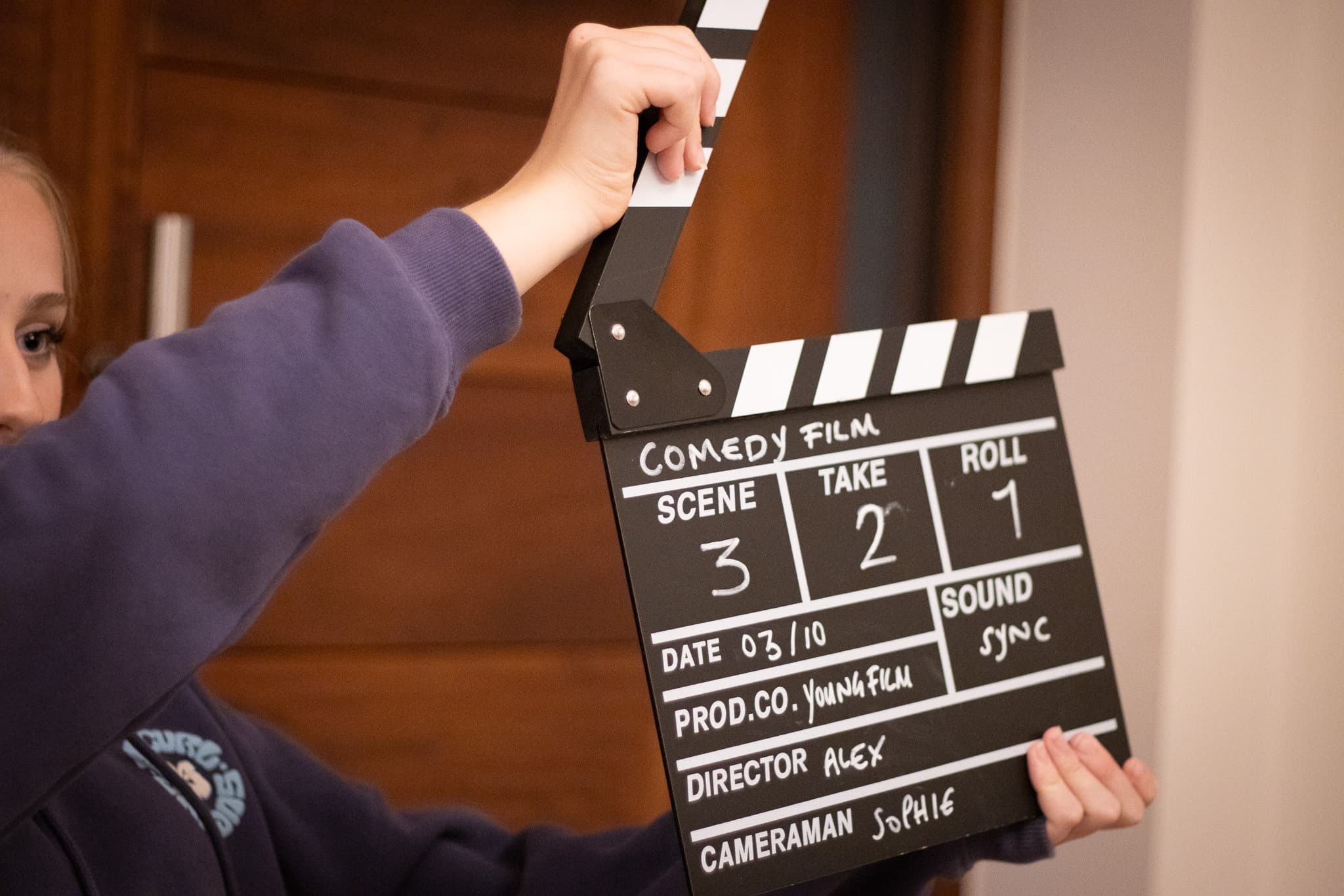 Young filmmaker with camera